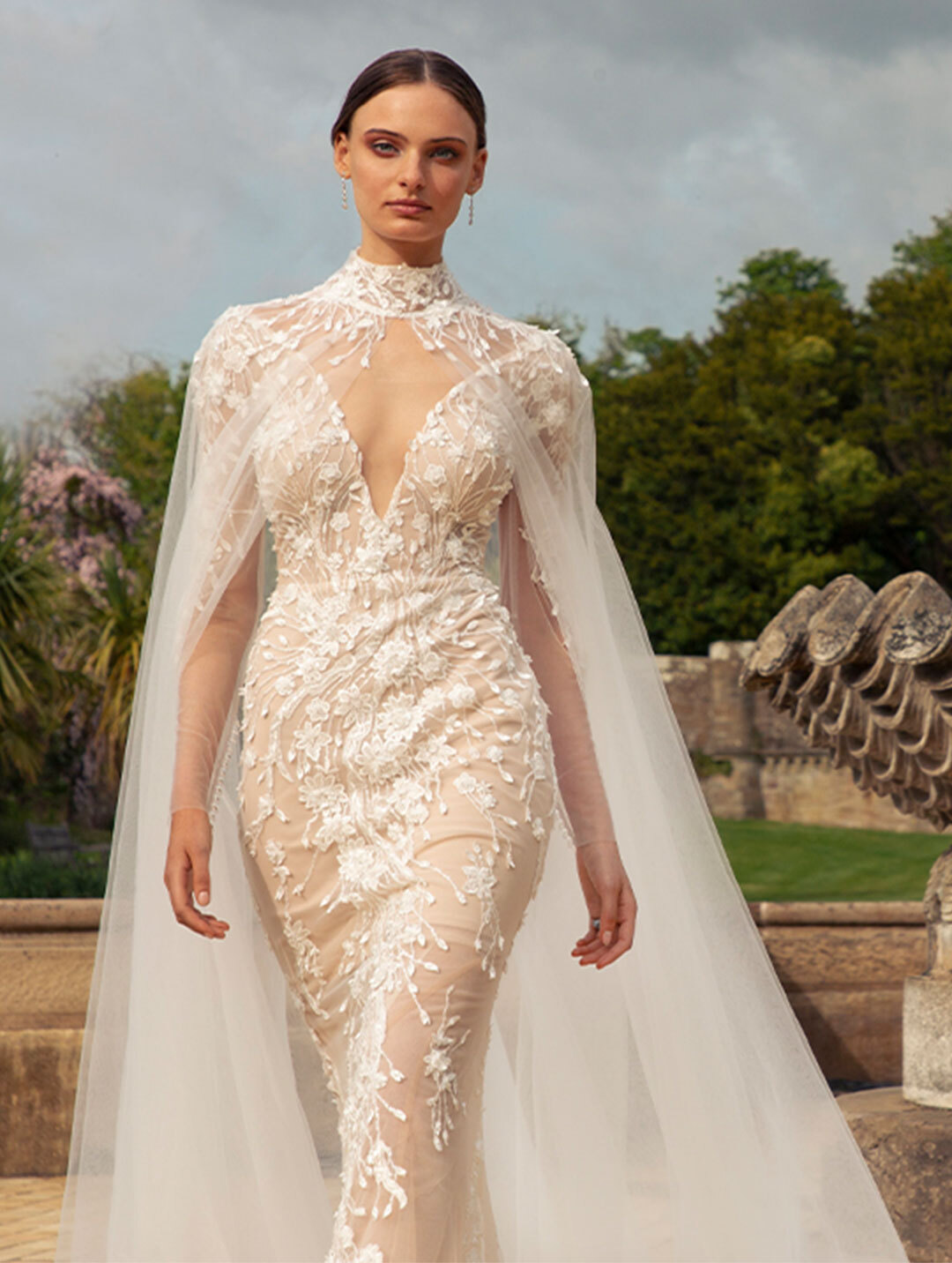 Model wearing a white Eleganza Iconica Wedding Dress in Glasgow UK